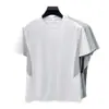 Camiseta de manga corta de seda helada para hombre para el verano con diseño de bloques de color de alta gama, cómoda y versátil para hombres jóvenes y de mediana edad