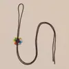 Pingentes de nó chinês, incluindo o design de nó "Tongxin", disponíveis em uma gama completa de cores. Marcadores de página de tamanho pequeno com pingentes de nó chinês. Fabricante de nós chineses