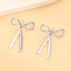 Pendientes transfronterizos, pendientes de lazo con explosión de Amazon, pendientes de alta gama, pendientes de moda que combinan con todo.
