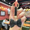 Chaveiro de Liga Metálica com Laço de Strass de Alta Qualidade, Totalmente Cravejado, Acessório de Bolsa Fofo e Divertido para Meninas
