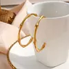Brincos Grandes de Bambu Abertos Finos da Moda Europeia e Americana Transfronteiriços Brincos de Aço Inoxidável 316L Galvanizados a Ouro 18K