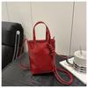 Corea del Sur nueva bolsa de teléfono móvil de moda casual simple ins versátil sensación de alta gama para ir al trabajo versátil color liso bandolera para mujer