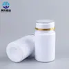 Venta al por mayor de fábrica Botellas de plástico de 80 cc para tabletas Embalaje separado a prueba de luz Botellas de plástico blanco engrosado Botellas de embalaje separado para caramelos
