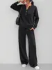 Conjunto deportivo casual de dos piezas para mujer, otoño e invierno 2026, transfronterizo europeo y americano, nuevo diseño de moda, top holgado de manga larga y pantalón de pierna ancha