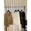 Um scoop doce de outono estilo coreano suave cintura marcada design slim decote V manga longa malha 62106