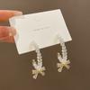 Corea del Sur Pendientes de lazo de cristal súper hada para mujer Temperamento de alta gama de lujo ligero Pendientes en forma de C Aguja de plata 925 Pendientes nuevos