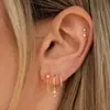 Pendientes de borlas de circonitas con incrustaciones de moda con baño de latón y oro real de venta caliente transfronteriza entre Europa y Estados Unidos, pendientes de personalidad para mujer