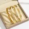 Suministrados directamente por el fabricante, los brazaletes de acero inoxidable son un gran éxito en todas las fronteras, Brazaletes de Acero de Titanio, Moda Europea y Americana Brazaletes Chapados en Oro 18K que No se Desvanecen