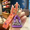 Llavero de Burro de Dibujos Animados Transfronterizo Lindo Estilo Girly Bolso Pequeño Estilo Chanel Llavero de Coche Colgante Figura Regalo