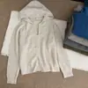 2026 Otoño Temprano Tejido de Gofre / Estilo Perezoso Retro Coreano Sudadera con Capucha de Punto de Doble Cremallera Suéter de Color Sólido Abrigo