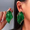 Pendientes de aleación con diseño irregular plisado y gota de aceite en forma de hoja, de moda, estilo minimalista, de lujo ligero, de venta caliente en Europa y América, versátiles para el uso diario de mujeres
