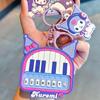 Llavero de concierto de Kulomi de Sanrio genuino para mujer, exquisito mini piano, colgante de bolsa multifuncional