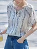 Verano 2026 Nuevo Estilo Lino Liso Azul Estilo Francés Perezoso Bordado Floral Holgado Manga Raglán Top Camisa Floral para Mujer