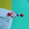 Pinza para el cabello de moda con diseño de bloques de color rojo y azul, forma de media luna con flor y lazo, estilo coreano, de alto valor, lindo clip lateral para niñas con flequillo