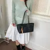 Bolsa Tote de Verão Vazada para Axila Feminina 2026 Novo Modelo de Alta Qualidade Grande Capacidade Bolsa de Mão Mãe-Filha Versátil Bolsa de Ombro