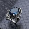 Anillo de topacio azul marino transfronterizo Chenrui Wish, joyería de mano con forma de huevo de ganso de plata tailandesa retro europea y americana.
