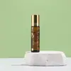 Botella de Vidrio con Cuentas de Gato de la Suerte 10ml Botella Transparente con Cuentas Vidrio para Té Botella de Aceite Esencial Botellas Bronceadas Venta al por Mayor Botella de Vidrio