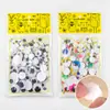Pegatinas de actividad para ojos en blanco y negro con respaldo adhesivo para manualidades infantiles, accesorios para el cabello con forma de globo ocular, venta al por mayor.