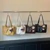 Bolso de hombro minimalista estilo coreano, bolso tote retro, bolso de mano de moda y versátil para el trabajo, nuevo para el otoño de 2026, transfronterizo