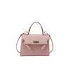 Colección Otoño 2026: Bolso nuevo, simple y moderno para mujer, con un diseño retro de moda, alto atractivo estético y un estilo versátil de hombro/cruzado en forma de cuadrado pequeño