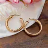 Pendientes de Aro Redondos Transfronterizos Europeos y Americanos Nicho Moda de Alta Gama Simples Aros Ligeros de Lujo Versátiles Exquisitos Accesorios para Orejas para Mujeres