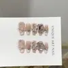 Puntas de uñas rosas hechas a mano de alta gama con un estilo suave, europeo y americano, con diseños de corazón, lazo y oso