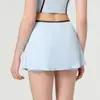 Minifalda deportiva anti-exposición para mujer, bloques de color, falso dos piezas, cordón, falda de tenis, secado rápido, con bolsillos, falda de yoga