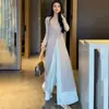 Cardigan Protector Solar Largo de Estilo Suave de Alta Gama para Mujer Conjunto Completo de Atuendo Estilo Té con Pantalones de Falda Caída Nuevo Conjunto de Dos Piezas