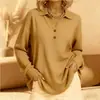 Enviado 2026 Moda transfronteriza top de punto con cuello polo decorado con botones en tono gris para mujer para usar como prenda exterior