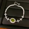 Pulsera geométrica ovalada de flor de circonita, elegante y única, de lujo ligero con un toque de alta gama, joyería de nicho al por mayor