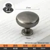 Único furo redondo torcido liga de zinco sólido espessado leve luxo único alça armário armário gaveta armário porta armário alça