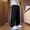 Calças masculinas com forro de fleece, calças casuais retas soltas da moda para outono/inverno, calças esportivas estilosas de perna larga para jovens