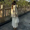 Saia Plissada de Lã Branca para Mulheres, Outono/Inverno 2025 Nova Cintura Alta Emagrecedora Linha A Petite Meia Saia Plissada