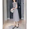 Vestido de Nova Estilo para Mulheres, Gola Redonda, Manga Curta, Padrão Pied-de-Poule, Elegante e Delicado, Cintura Marcada, Emagrecedor, Comprimento Médio, Saia Evasê, Primavera de 2026