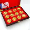 Cuenco de oro conmemorativo del zodíaco, caja de madera, traje de serpiente del zodíaco, medallón conmemorativo, se vende como regalo de apertura de seguro.