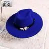 Nuevo sombrero para mujer de otoño e invierno 2015 sombrero de copa de ala ancha estilo británico sombrero de copa de punto para otoño e invierno sombrero de jazz sombrero de pareja