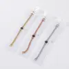 Acero de titanio chapado en oro rosa letras retro pulsera redonda negra joyería para mujer fabricantes al por mayor