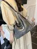 Bolsa tote de gran capacidad para mujer, nueva moda 2026, bolso de hombro versátil, mochila de alta gama para estudiante universitario para salir