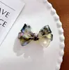 Duowei joyería retro todo partido banda para el pelo de lazo cuerda para el pelo cabeza de bola coleta alta banda elástica pinza de pico de pato de acetato accesorios para el cabello