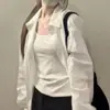 Camisola Blanca con Almohadillas en el Pecho para Mujer, Nueva Prenda Exterior Ajustada Sin Mangas para Primavera 2026 con Hermoso Diseño en la Espalda