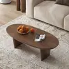 Mesa de centro ovalada de madera maciza negra, mesa de té de lujo ligero estilo italiano para el hogar, mesa auxiliar simple de madera natural para sofá