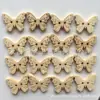 Hebilla de madera de animal de dibujos animados transfronteriza 17*24 mm botón de mariposa hebilla de tronco accesorios de ropa DIY al por mayor en stock