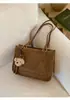 Bolsa de Axila com Textura Retrô Bolsa de Ombro para o Dia a Dia Feminina 2025 Nova Bolsa Tote Tecida Simples Versátil