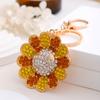 Estilo coreano leve luxo diamante-embutido smiley rosto girassol chaveiro saco carro pendente chaveiro