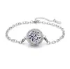 Pulsera de acero titanio con incrustaciones de diamantes calada tipo hilo de aromaterapia para difusión de aceites esenciales Pulsera con patrón de árbol de la vida europeo y americano venta al por mayor