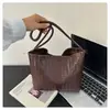 Estilo europeu e americano transfronteiriço, tecido retrô inspirado em coreano 2026 simples bolsa tote casual de textura macia e bolsa de ombro tipo balde para mulheres