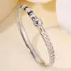Pulsera de Acero de Titanio Moda Transfronteriza Europea y Americana Círculo Pulsera con Estampado de Leopardo para Niñas Gama Alta Goteo de Aceite Pulsera 18K que No se Desvanece