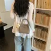Set de Bolsos Minimalistas Transfronterizos para Mujer 2026 Nuevo Bolso Cubo para el Trabajo Bolso de Hombro Cruzado Texturizado de Verano