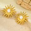 Pendientes de perlas de girasol de acero inoxidable de alta gama, estilo retro francés transfronterizo, joyería europea y americana de alta gama.