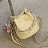 Bolsa de mão de moda transfronteiriça estilo coreano para mulheres, nova bolsa de balde com padrão de diamante 2026, bolsa de ombro única e crossbody fresca